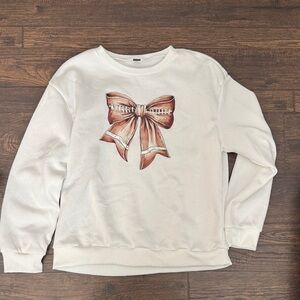 SHEIN Cream Sweatshirt with Brown football Bow Design